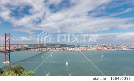 Panorama showing Lisbon cityscape and Tagus river timelapse with 25 of April bridge 116405358