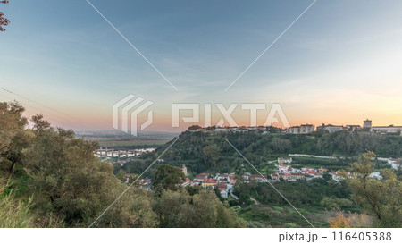 Panorama showing sunset over the Castle of Almourol on hill in Santarem aerial timelapse. Portugal 116405388