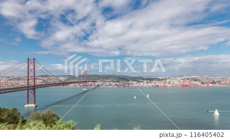 Panorama showing Lisbon cityscape and Tagus river timelapse with 25 of April bridge Panorama showing Lisbon cityscape and Tagus river timelapse with 25 of April bridge 116405402