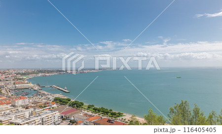 Panorama showing aerial view of marina and city center timelapse in Setubal, Portugal. 116405405