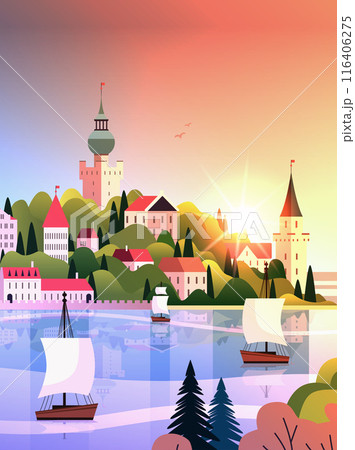 Sunset seaside town with sailing ships colorful landscape with houses trees hills and water reflection scenic view travel concept background 116406275