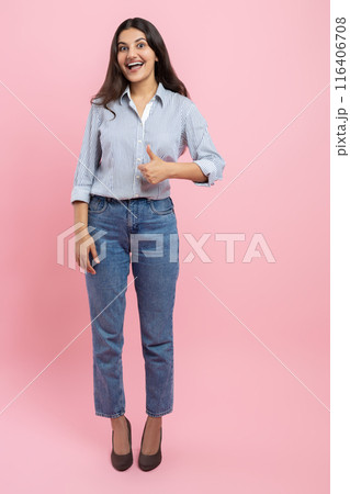 Full length of Indian woman showing like gesture Full length of Indian woman showing like gesture 116406708