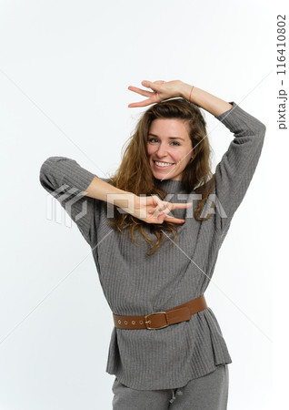 Attractive young woman on a white background. 116410802