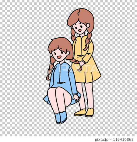 Two girls are sitting on the ground, one of them is wearing a blue dress 116410868