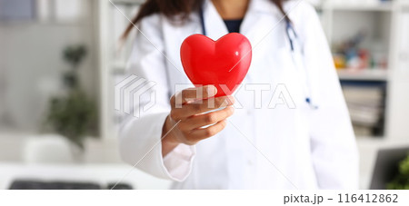 Female doctor hold in arms and cover red Female doctor hold in arms and cover red 116412862