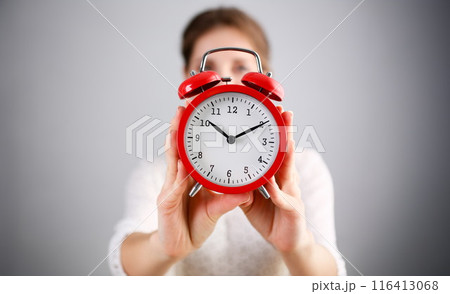 Adult smiling caucasian woman hold red 116413068
