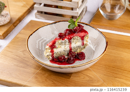 Poppy seed cake with cherry topping Poppy seed cake with cherry topping 116415239