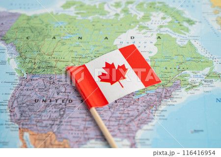 Bangkok, Thailand June 14, 2024, Canada flag on world map background. Bangkok, Thailand June 14, 2024, Canada flag on world map background. 116416954