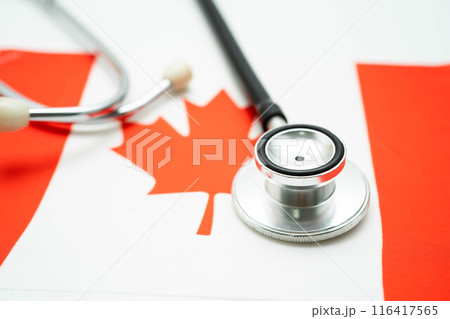 Stethoscope on Canada flag, Business and finance. 116417565
