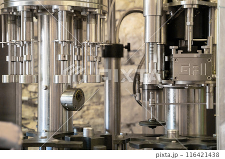 Industrial machinery for beverage bottling for production in factories 116421438