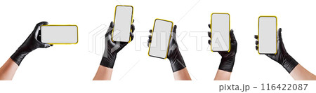 Hand in black glove holding mobile phone with blank screen isolated on white Hand in black glove holding mobile phone with blank screen isolated on white 116422087