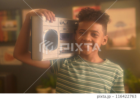 Portrait of Smiling Boy with Boombox on Shoulder Portrait of Smiling Boy with Boombox on Shoulder 116422763