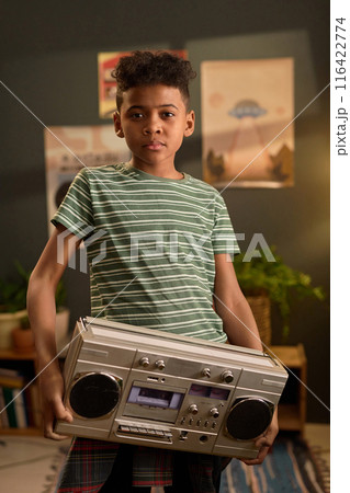 Little Black Boy Holding Boombox in Living Room Little Black Boy Holding Boombox in Living Room 116422774