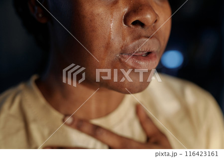 Part of face of young crying woman Part of face of young crying woman 116423161