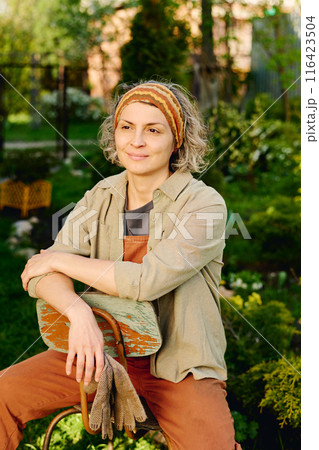 Smiling mature female agronomist Smiling mature female agronomist 116423504