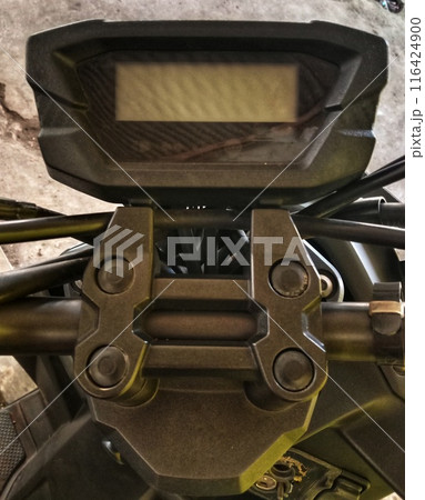 old machine parts in machinery shop. Speedometer moltorbike. old machine parts in machinery shop. Speedometer moltorbike. 116424900
