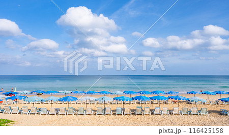 Beach in summer season at Phuket Thailand. Concept Travel and tour background,Empty beach copy space with waves crashing on sand Beach in summer season at Phuket Thailand. Concept Travel and tour background,Empty beach copy space with waves crashing on sand 116425158