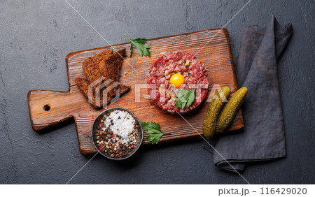 Savory beef tartare and brown bread toasts Savory beef tartare and brown bread toasts 116429020