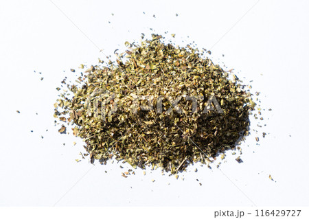 Dried herb mixture seasoning on white background, close-up, top view. Dried herb mixture seasoning on white background, close-up, top view. 116429727