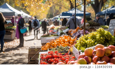 Vibrant display of fresh produce at a bustling farmers market. 116430599