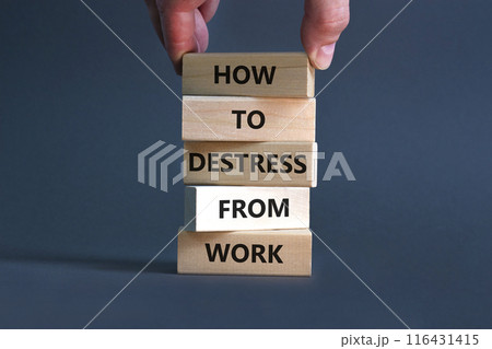Destress from work symbol. Concept words How to destress from work on wooden blocks. Doctor hand. Beautiful grey background. Psychological business and destress from work concept. Copy space. 116431415