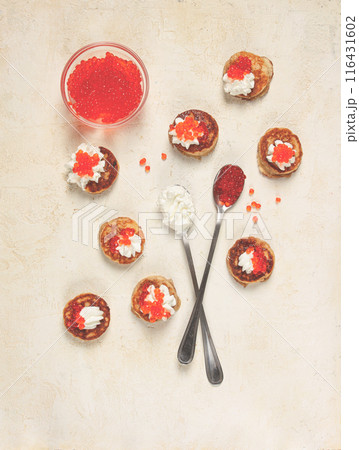 Demidoff pancakes, mini pancakes, with sour cream and red caviar, crepes. homemade, no people, Demidoff pancakes, mini pancakes, with sour cream and red caviar, crepes. homemade, no people, 116431602