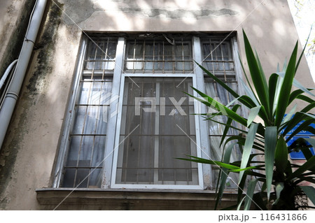 Small window as architectural housing construction in Israel. 116431866