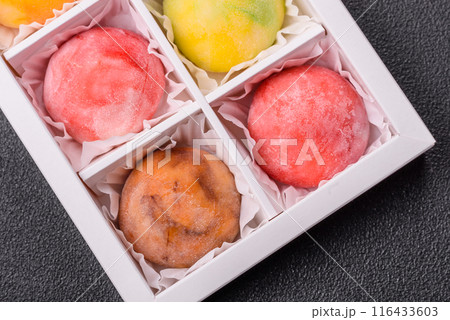 Delicious colorful asian mochi sweets with rice dough shell Delicious colorful asian mochi sweets with rice dough shell 116433603