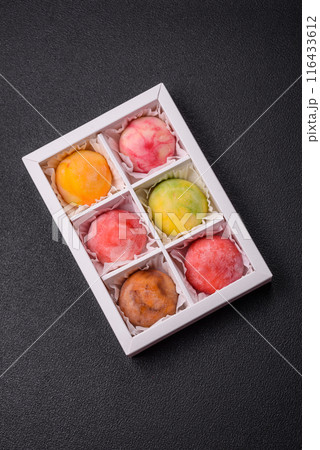Delicious colorful asian mochi sweets with rice dough shell 116433612