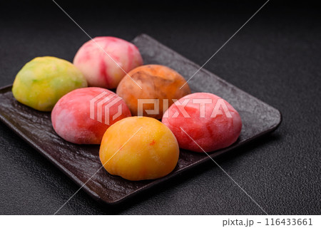 Delicious colorful asian mochi sweets with rice dough shell 116433661