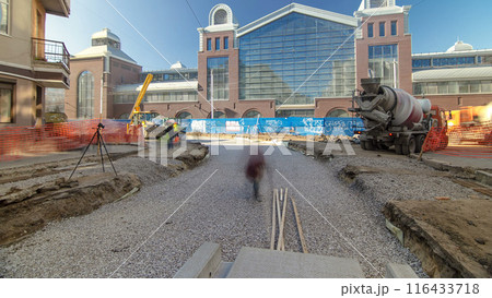 Concrete works for road maintenance construction site with many workers and mixer timelapse Concrete works for road maintenance construction site with many workers and mixer timelapse 116433718