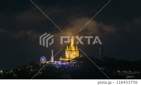 Temple of the Sacred Heart of Jesus timelapse on Tibidabo Mountain in Barcelona in clouds, Catalonia, Spain 116433750