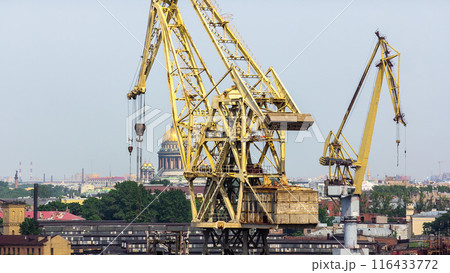 Working yellow cranes at shipyard aerial timelapse Working yellow cranes at shipyard aerial timelapse 116433772