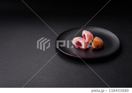 Delicious colorful asian mochi sweets with rice dough shell 116433880