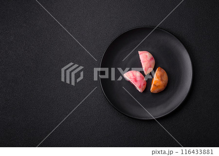 Delicious colorful asian mochi sweets with rice dough shell 116433881