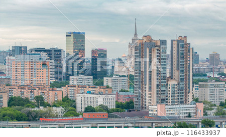 Aerial view to cityscape skyline with World Trade Center towers and hotel Ukraine timelapse in Moscow, Russia. Aerial view to cityscape skyline with World Trade Center towers and hotel Ukraine timelapse in Moscow, Russia. 116433937