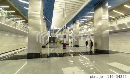 Interior of a modern subway station with trains timelapse 116434233