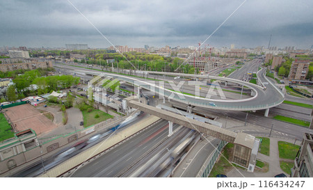 Traffic jams of roadside, transportation motion in a big city. Rush hour traffic on a city roads aerial timelapse. 116434247