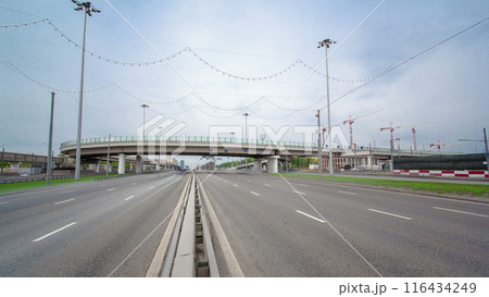 Traffic jams of roadside, transportation motion in a big city. Rush hour traffic on a city roads timelapse. 116434249