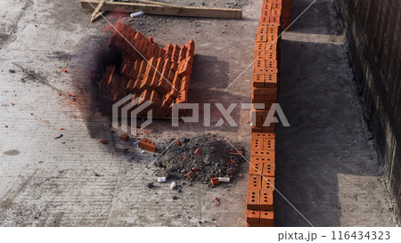 Bricklayers laying bricks to make a walls timelapse. Bricklayers laying bricks to make a walls timelapse. 116434323