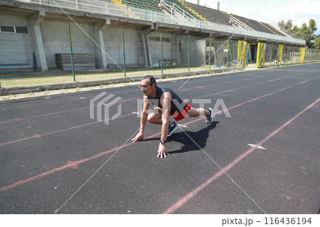 The Body Of A Professional Runner Stretching The Body Of A Professional Runner Stretching 116436194