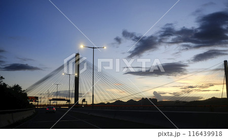 Silhouette of transportation bridge with cars, road at sunset of transportation bridge with cars, road at sunset Silhouette of transportation bridge with cars, road at sunset of transportation bridge with cars, road at sunset 116439918