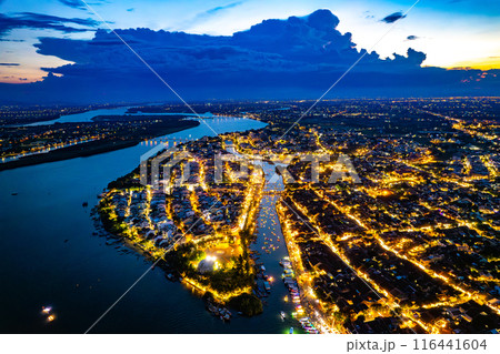 Aerial view of Hoi An Ancient Town with lantern boats on Hoai river, in Hoi An, Vietnam 116441604