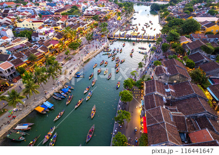 Aerial view of Hoi An Ancient Town with lantern boats on Hoai river, in Hoi An, Vietnam 116441647
