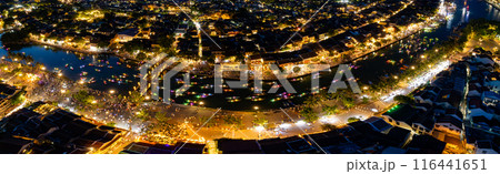 Aerial view of Hoi An Ancient Town with lantern boats on Hoai river, in Hoi An, Vietnam 116441651