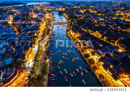 Aerial view of Hoi An Ancient Town with lantern boats on Hoai river, in Hoi An, Vietnam Aerial view of Hoi An Ancient Town with lantern boats on Hoai river, in Hoi An, Vietnam 116441812