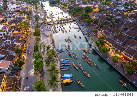 Aerial view of Hoi An Ancient Town with lantern boats on Hoai river, in Hoi An, Vietnam 116441841
