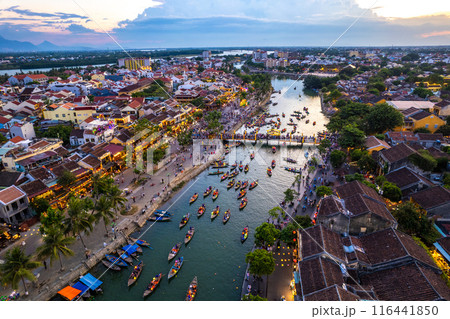 Aerial view of Hoi An Ancient Town with lantern boats on Hoai river, in Hoi An, Vietnam Aerial view of Hoi An Ancient Town with lantern boats on Hoai river, in Hoi An, Vietnam 116441850