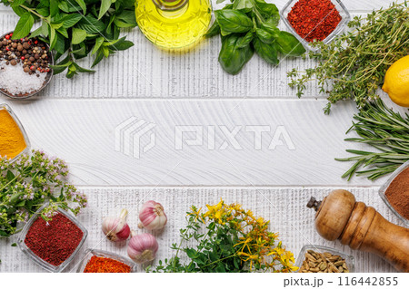 Various herbs and spices on the table 116442855