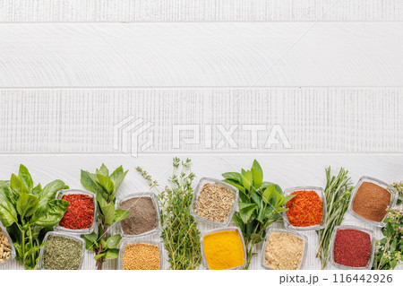 Various herbs and spices on the table 116442926